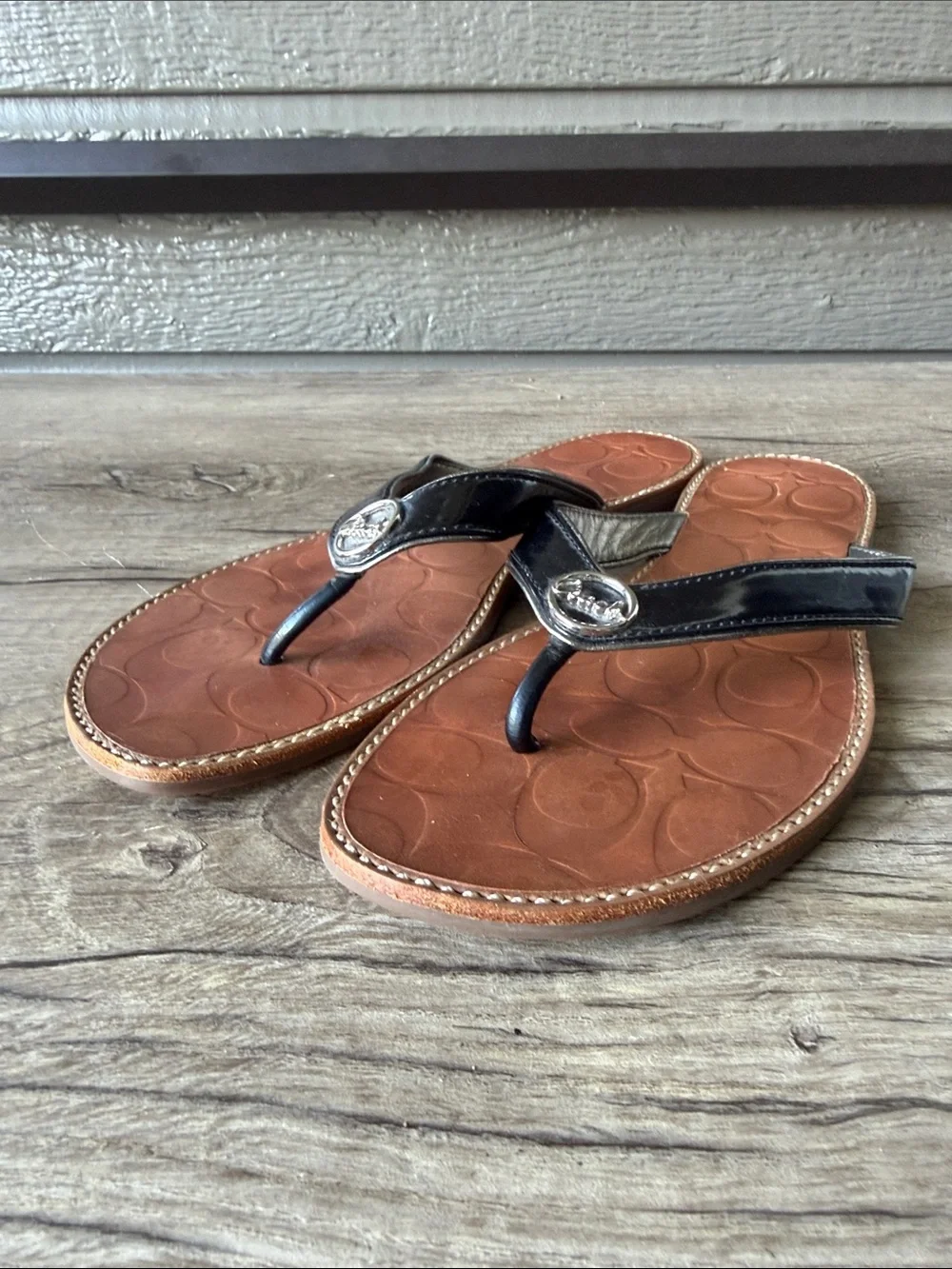 Coach Black Leather Thong Sandals with Brown Embossed Footbed size 8 B